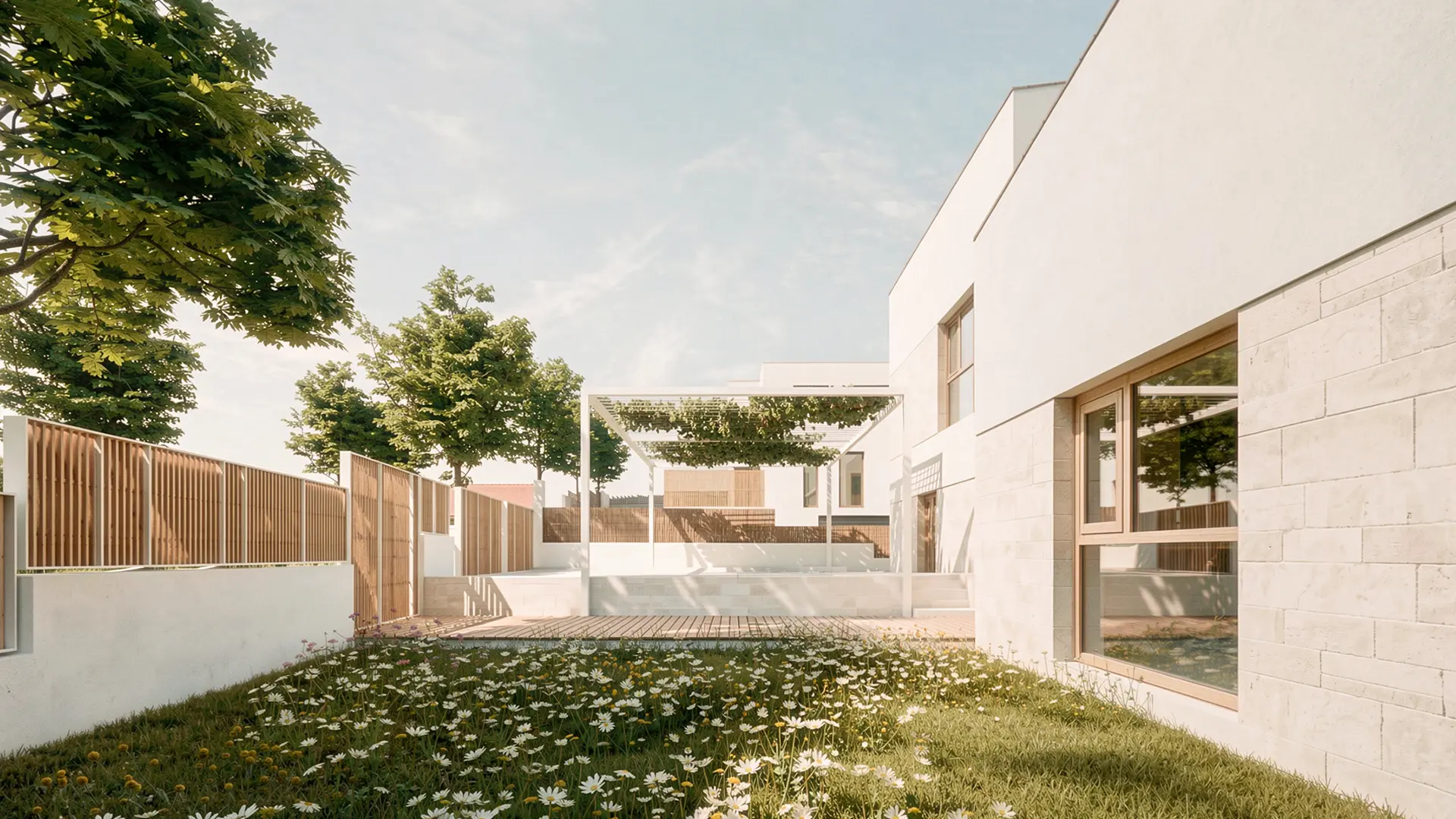 Jardín de entrada de vivienda unifamiliar de obra nueva en L'Ametlla del Vallès, con pradera silvestre, pérgola metálica, cerramientos de lamas de madera y fachada de piedra natural. Proyecto de Tova Arquitectura